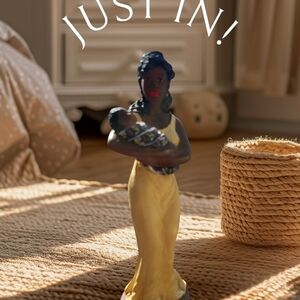 Elegant Figurine in Yellow Dress